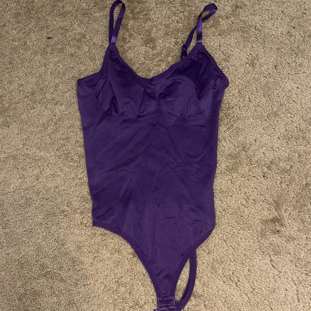 Purple woman’s bodysuit